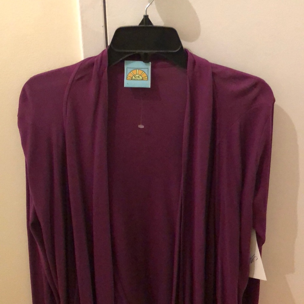 Brand new purple open cardigan.